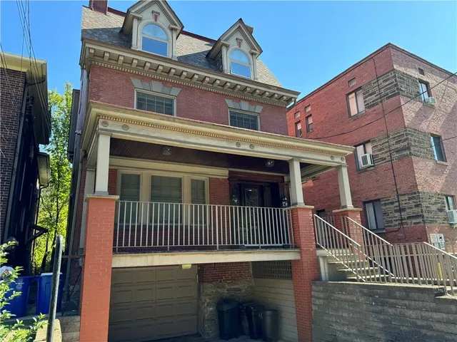 a view of a house with a deck