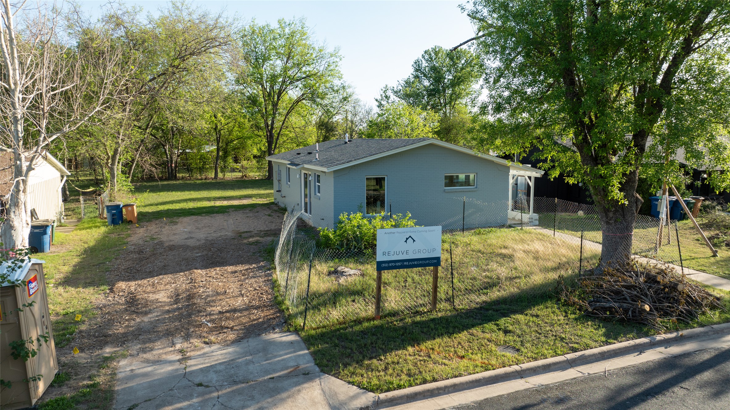 4902 Blueberry Trail, Unit 2 & 3 Austin, TX 78723 - Photo 12 of 38 a front view of a house with garden