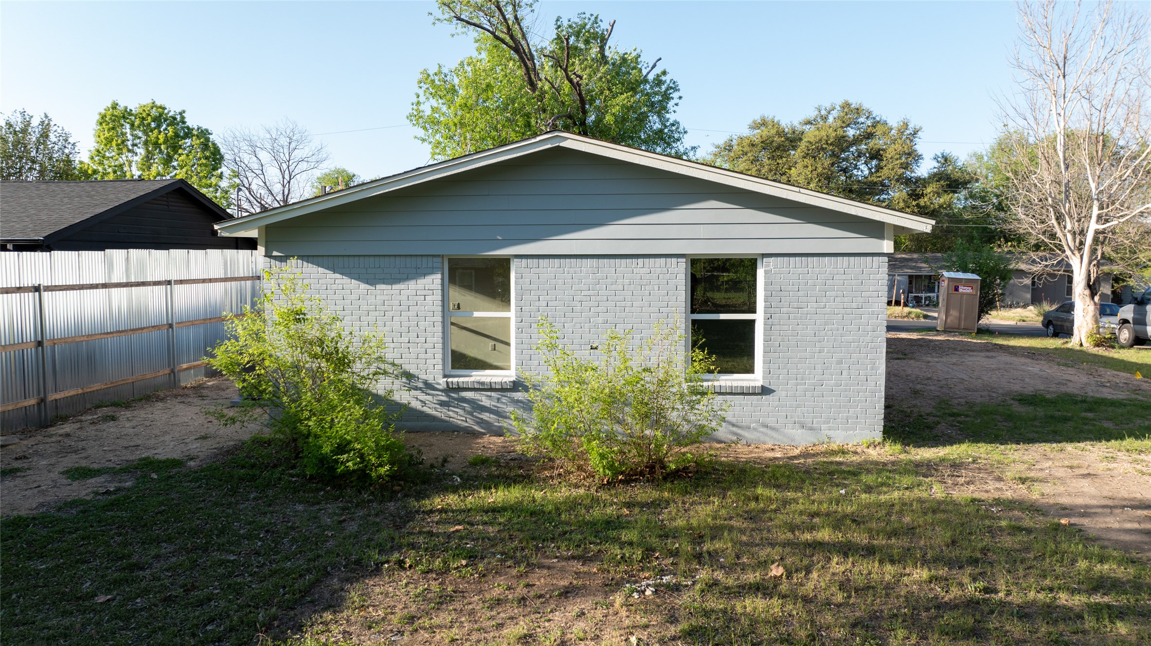 4902 Blueberry Trail, Unit 2 & 3 Austin, TX 78723 - Photo 16 of 38 a front view of house with yard and trees around