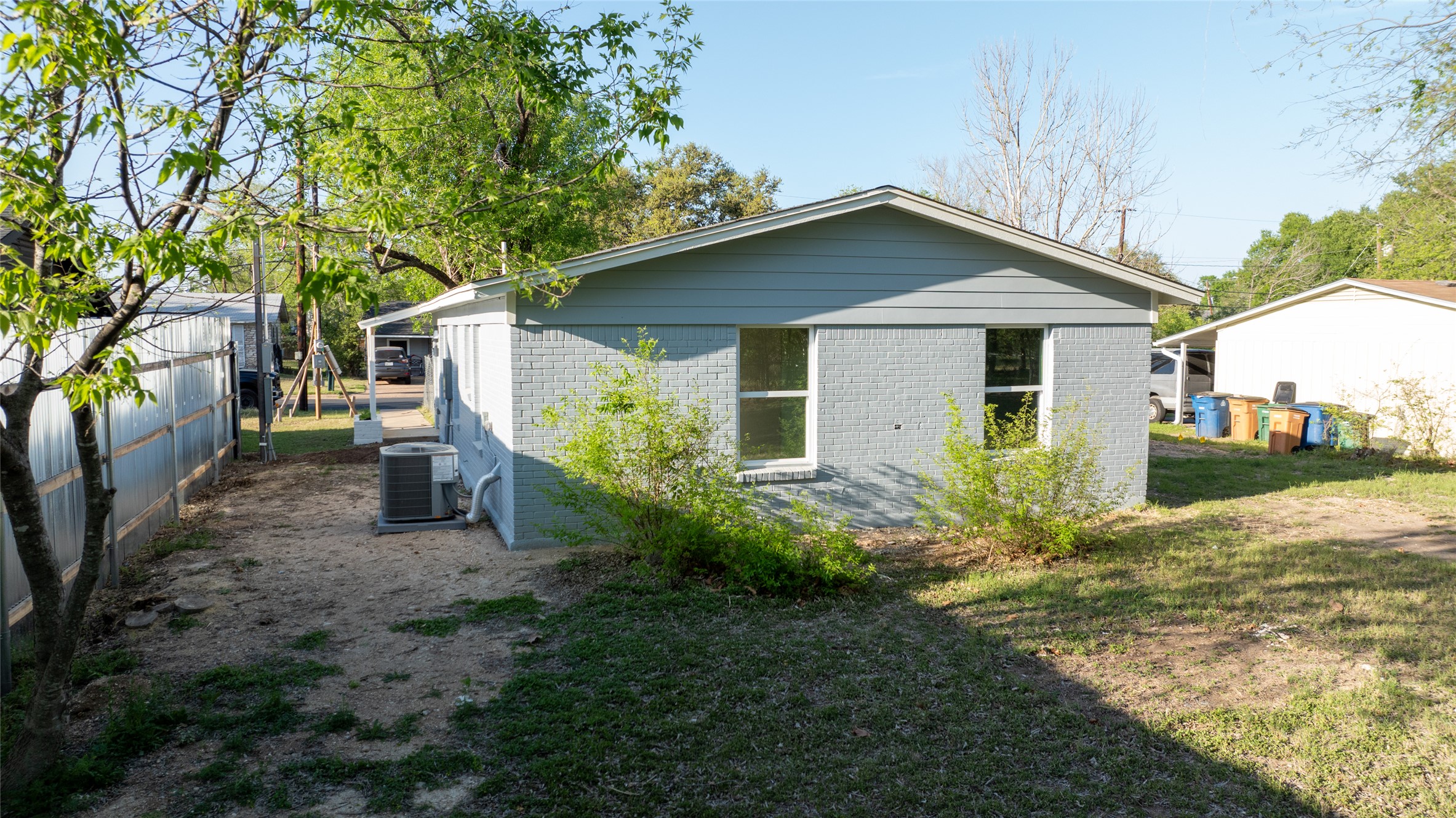 4902 Blueberry Trail, Unit 2 & 3 Austin, TX 78723 - Photo 17 of 38 a view of a house with backyard and garden