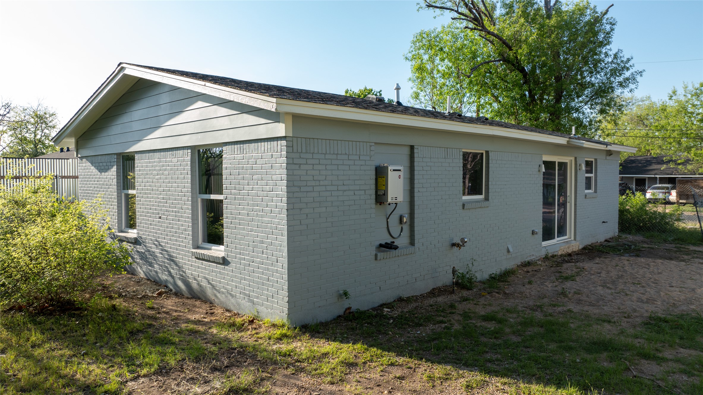 4902 Blueberry Trail, Unit 2 & 3 Austin, TX 78723 - Photo 20 of 38 a view of a house with backyard and garden