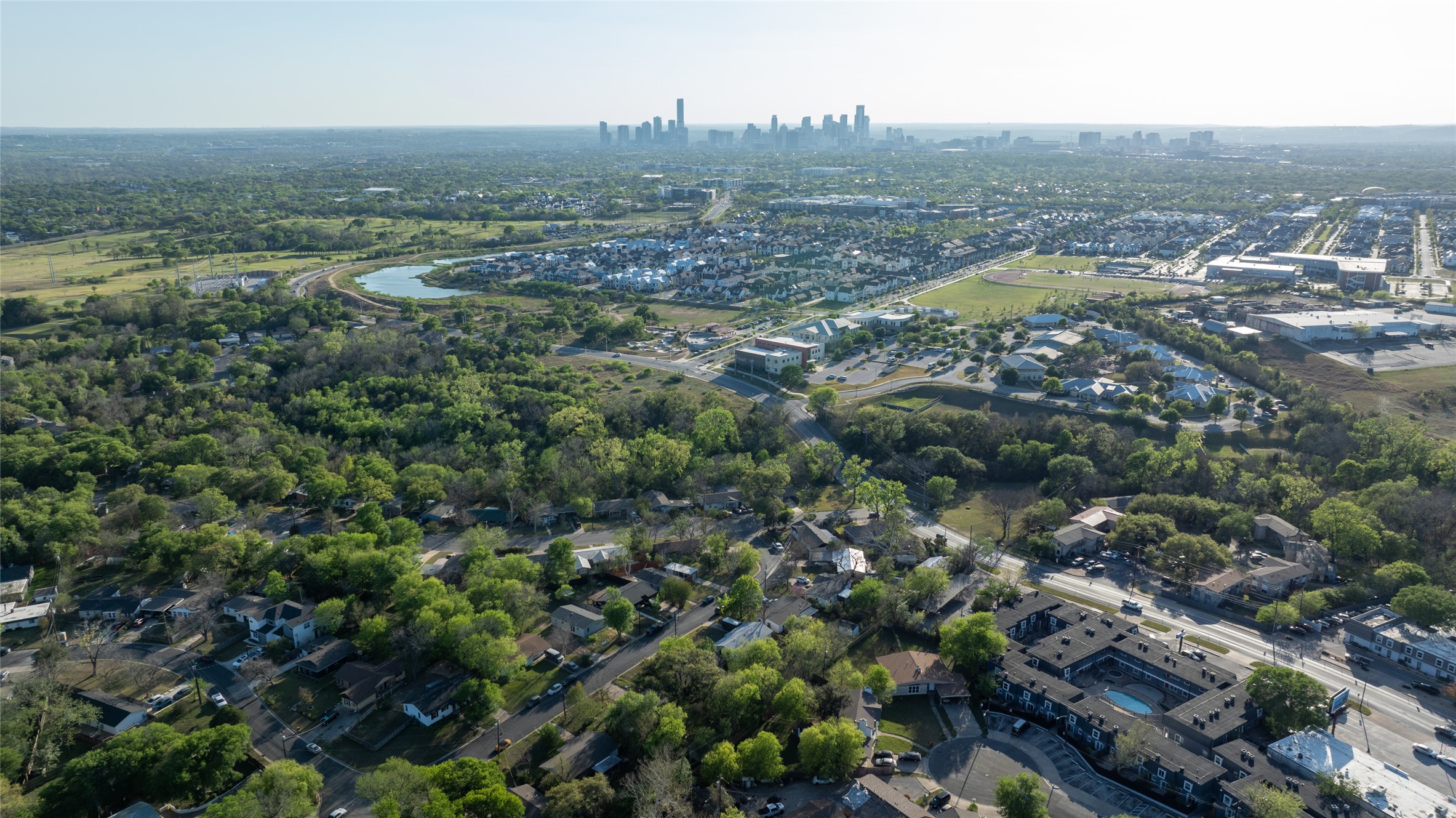 4902 Blueberry Trail, Unit 2 & 3 Austin, TX 78723 - Photo 25 of 38 an aerial view of residential houses with outdoor space and trees