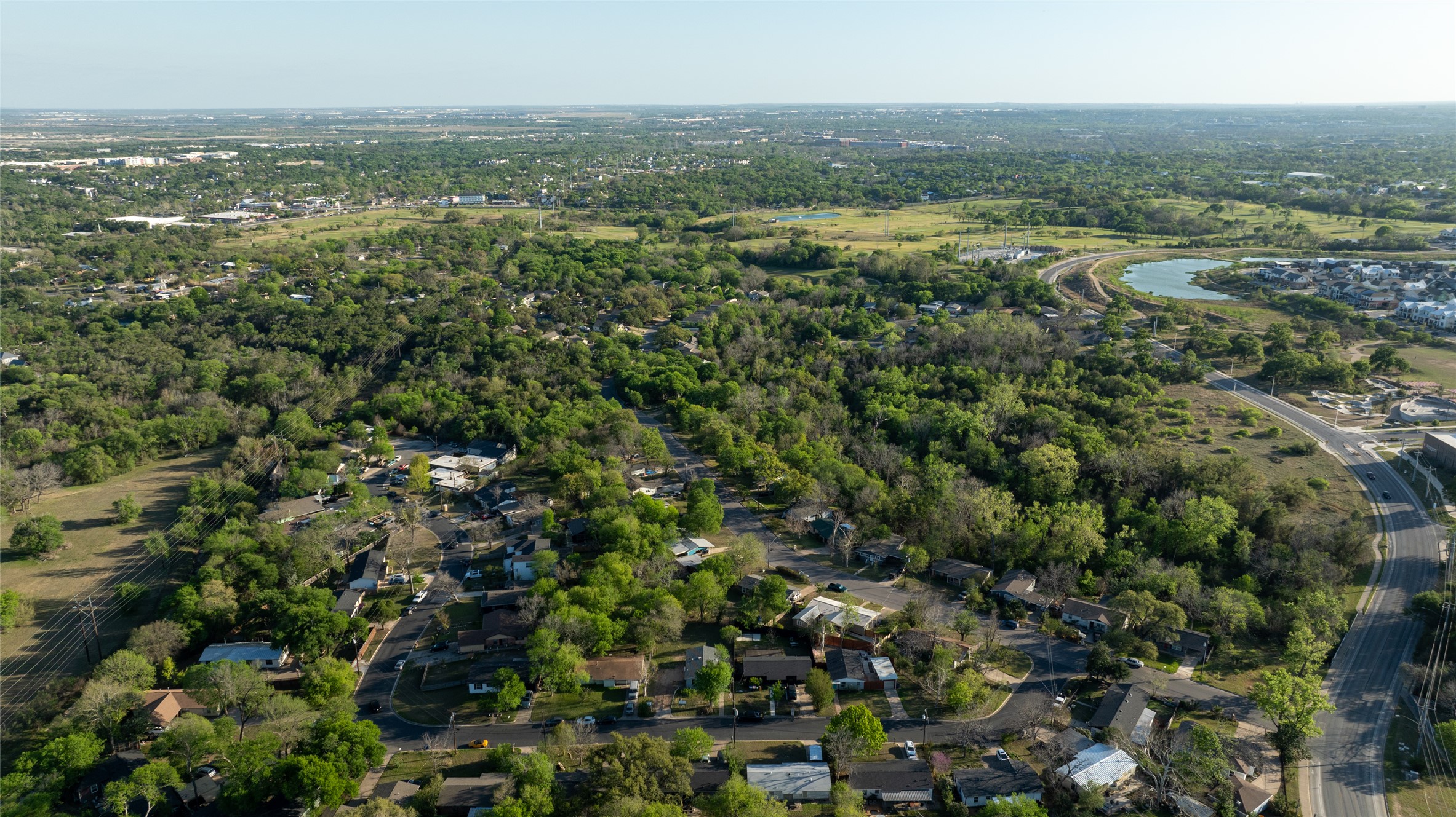 4902 Blueberry Trail, Unit 2 & 3 Austin, TX 78723 - Photo 26 of 38 an aerial view of residential houses with outdoor space and trees