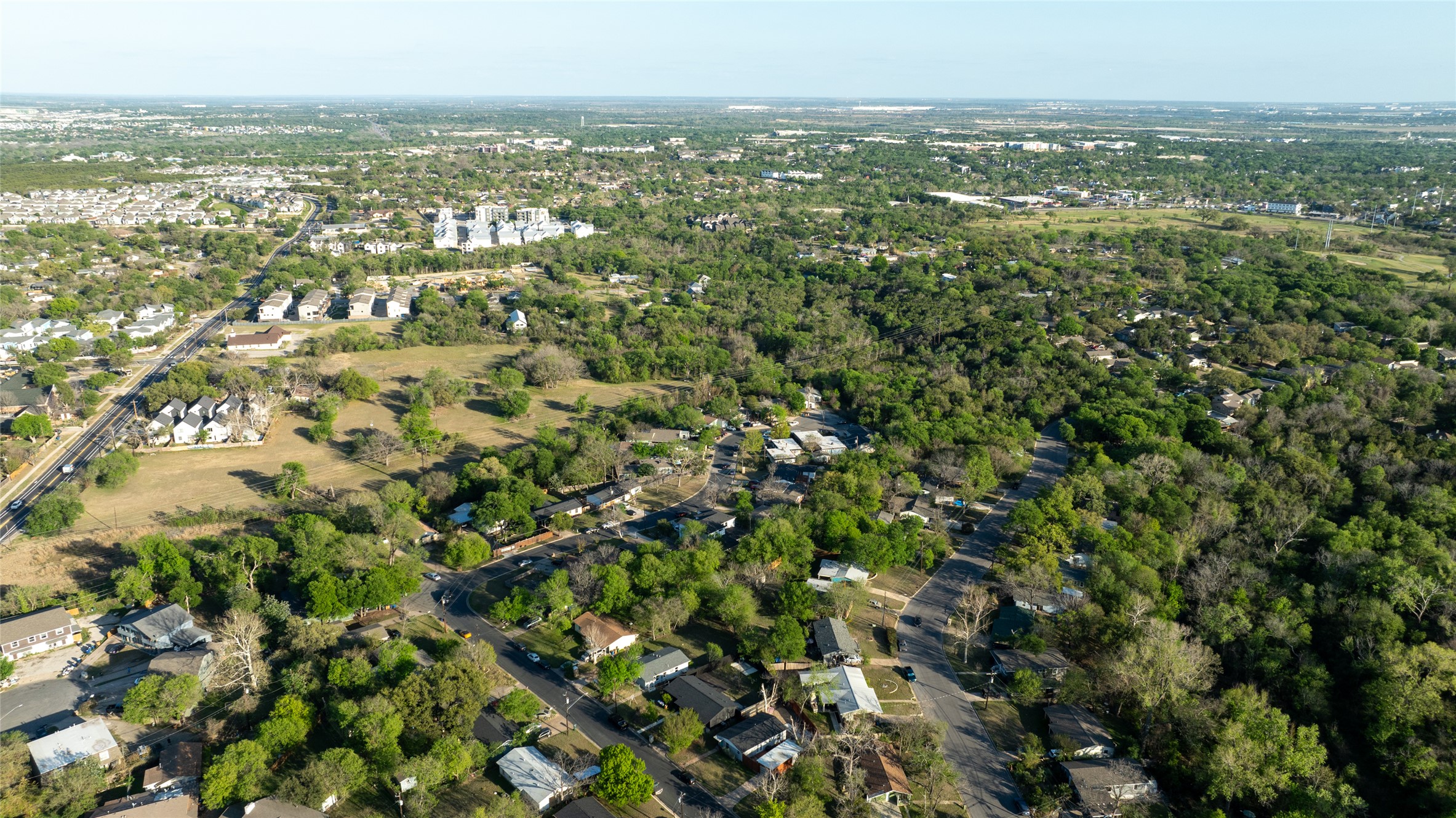 4902 Blueberry Trail, Unit 2 & 3 Austin, TX 78723 - Photo 27 of 38 an aerial view of residential houses with outdoor space and trees