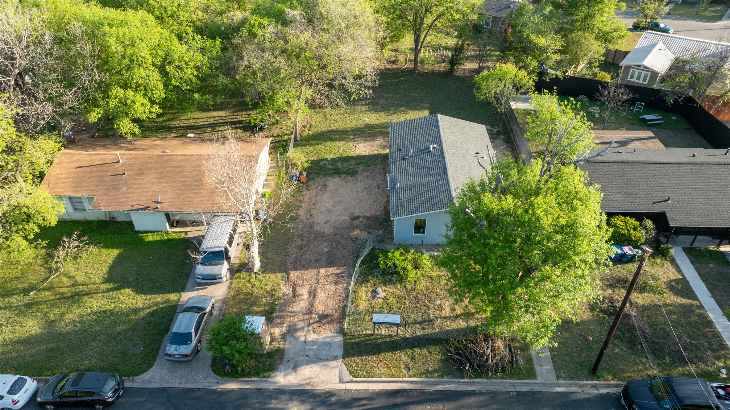 4902 Blueberry Trail, Unit 2 & 3 Austin, TX 78723 - Photo 36 of 38 an aerial view of a house with a yard basket ball court and outdoor seating