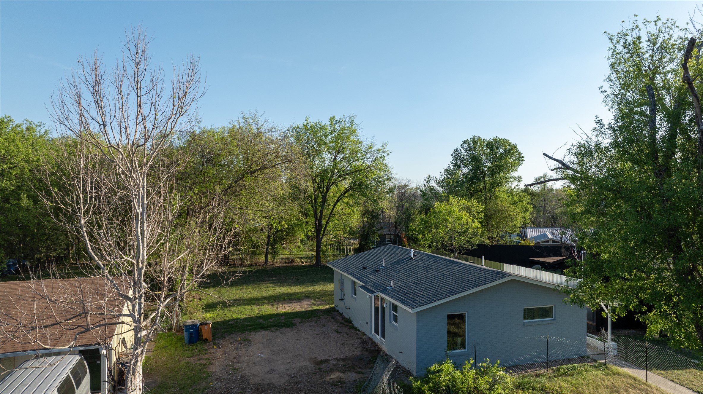 4902 Blueberry Trail, Unit 2 & 3 Austin, TX 78723 - Photo 37 of 38 a view of an house with a yard