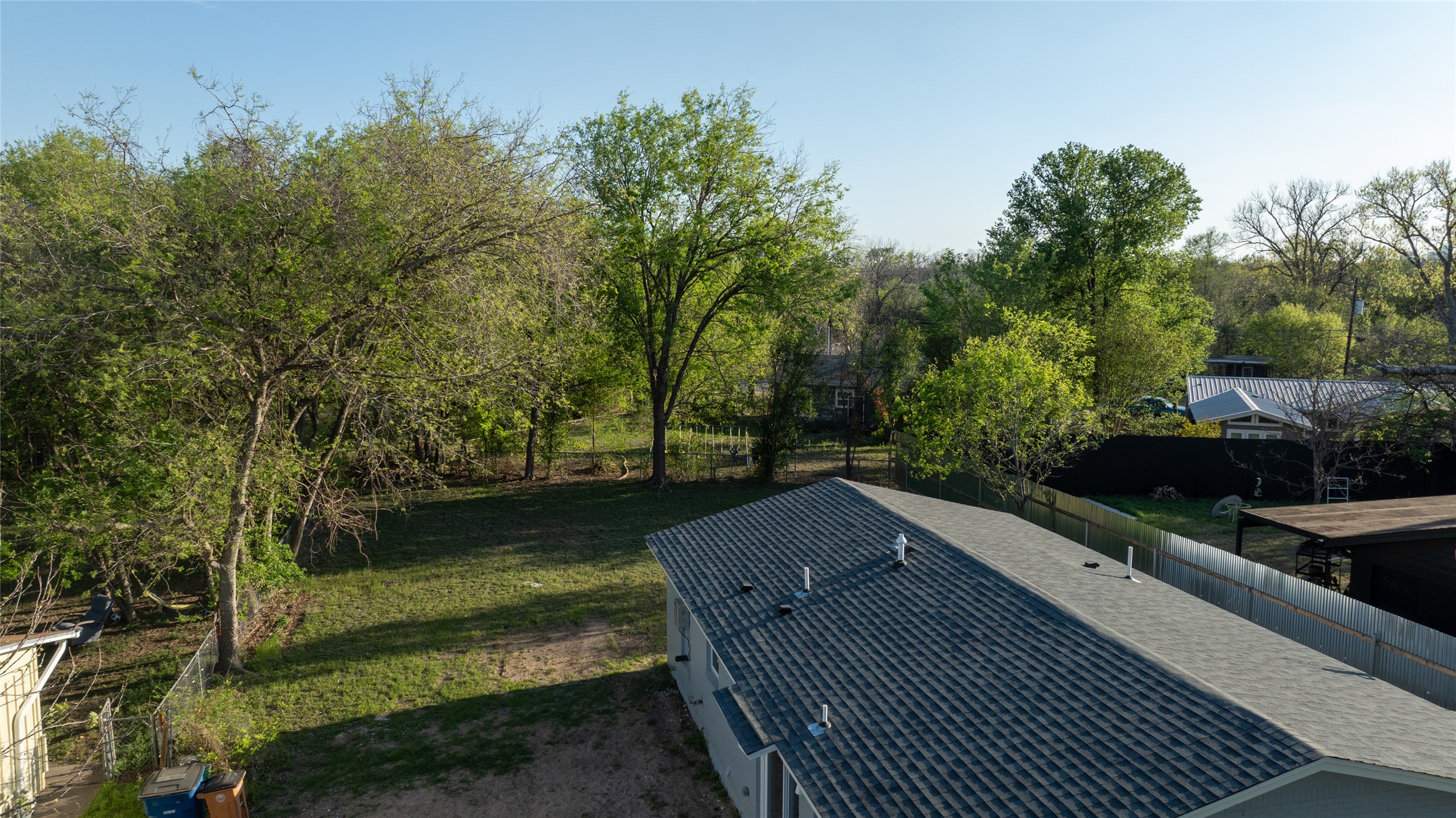 4902 Blueberry Trail, Unit 2 & 3 Austin, TX 78723 - Photo 38 of 38 a view of a yard from a balcony