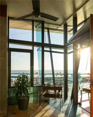 a view of roof deck with furniture