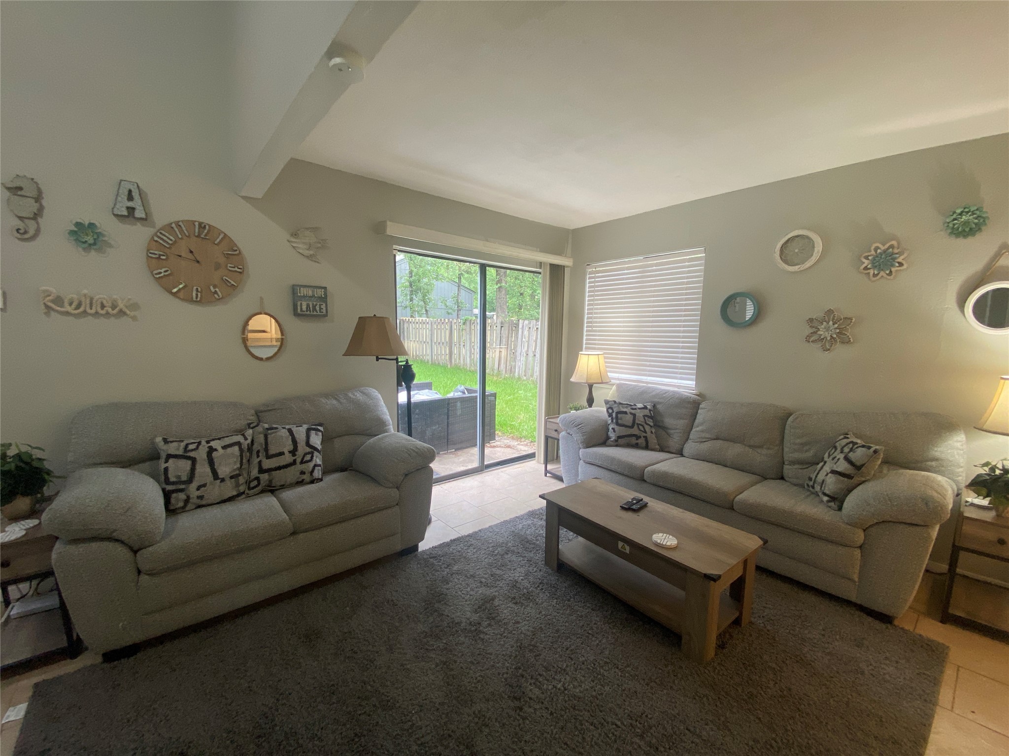 28604 Magnolia Court Point Blank, TX 77364 - Photo 25 of 30 a living room with furniture and a large window