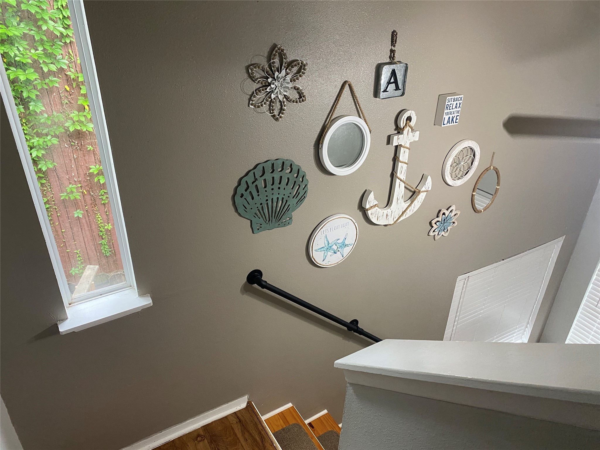28604 Magnolia Court Point Blank, TX 77364 - Photo 6 of 30 a bathroom with a sink mirror and vanity