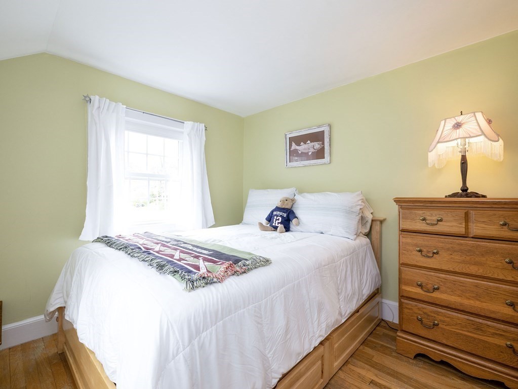 33 Bay View Road Wellesley, MA 02482 - Photo 24 of 32 a bedroom with a bed and a window
