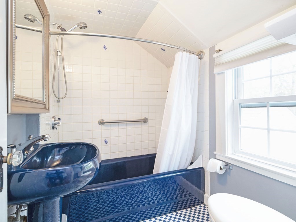 33 Bay View Road Wellesley, MA 02482 - Photo 29 of 32 a bathroom with a sink a toilet and shower