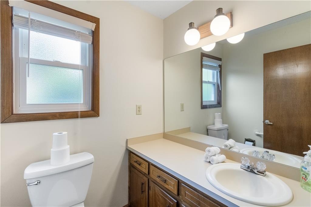 3711 Frey Lake Road Northwest Kennesaw, GA 30144 - Photo 11 of 37 a bathroom with a toilet sink and mirror