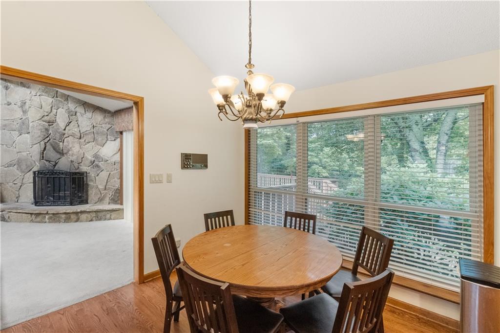 3711 Frey Lake Road Northwest Kennesaw, GA 30144 - Photo 13 of 37 a view of a dining room with furniture window and outside view