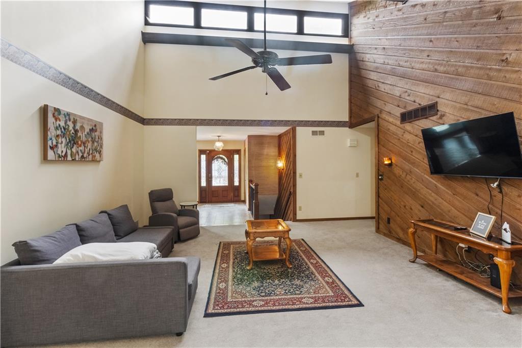 3711 Frey Lake Road Northwest Kennesaw, GA 30144 - Photo 14 of 37 a living room with furniture and a flat screen tv