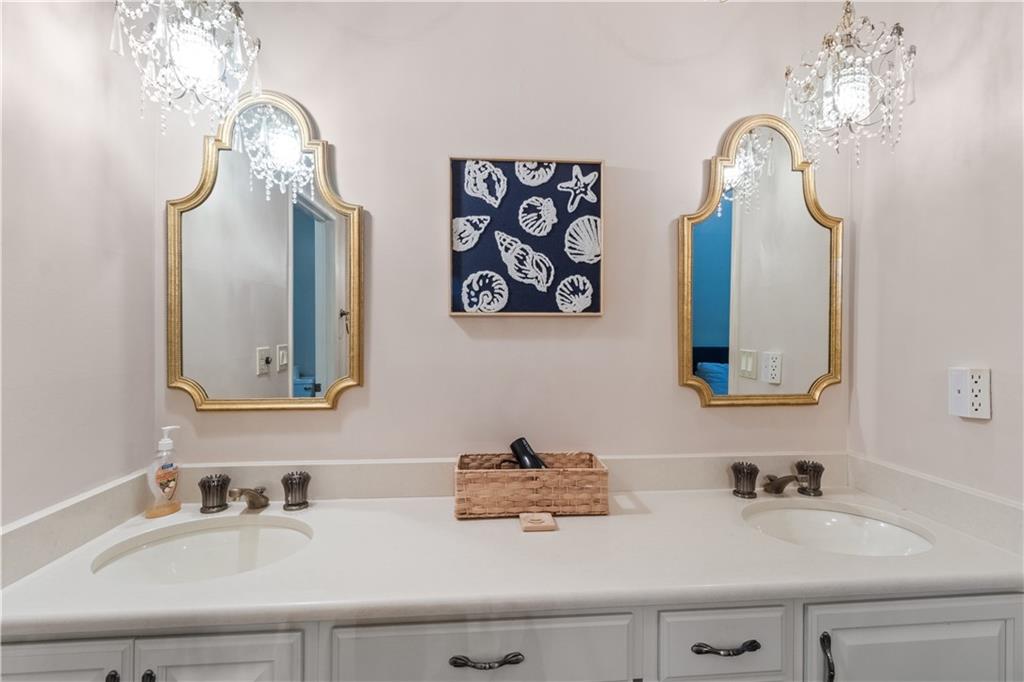 3711 Frey Lake Road Northwest Kennesaw, GA 30144 - Photo 21 of 37 a bathroom with a sink and a mirror