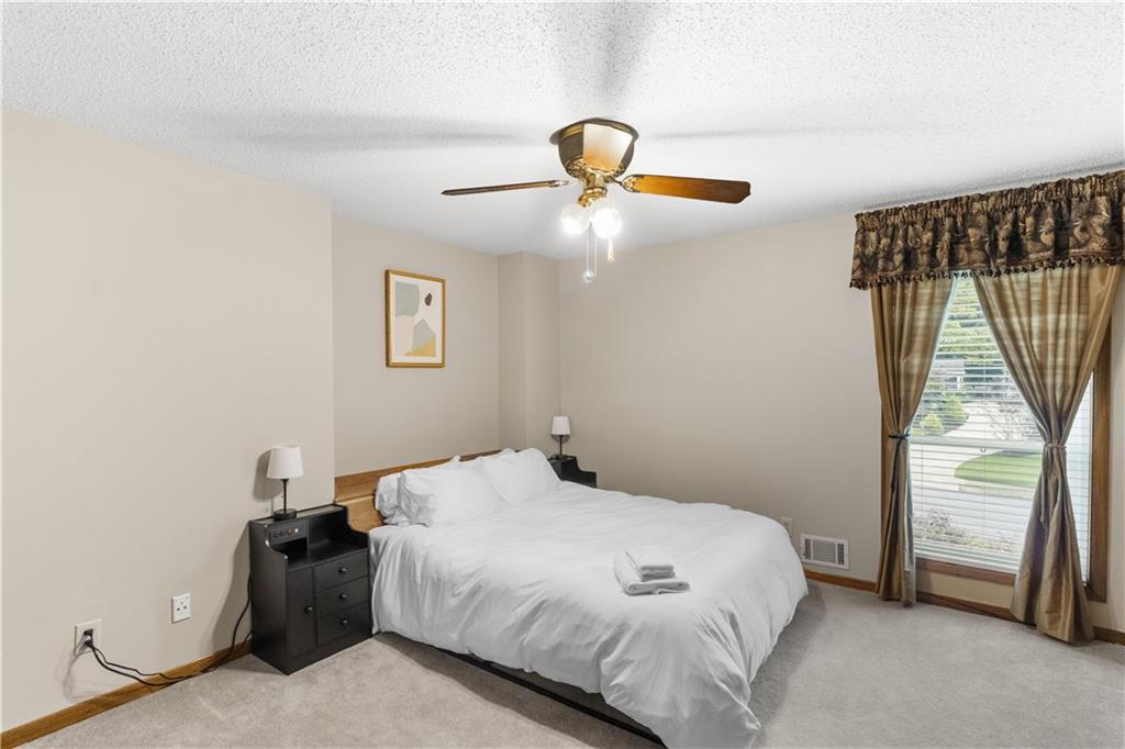 3711 Frey Lake Road Northwest Kennesaw, GA 30144 - Photo 22 of 37 a bedroom with a bed and a window