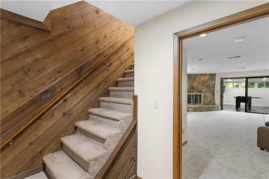 3711 Frey Lake Road Northwest Kennesaw, GA 30144 - Photo 25 of 37 a view of staircase with white walls and windows