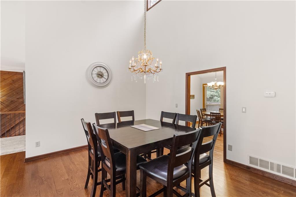 3711 Frey Lake Road Northwest Kennesaw, GA 30144 - Photo 8 of 37 a dining room with furniture and wooden floor