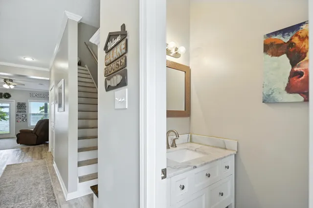 a view of a livingroom with furniture and a window