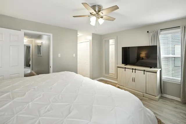 a roof deck with a table and chairs