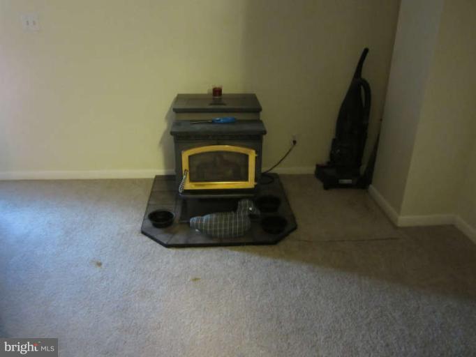15 Crafton Road Baltimore, MD 21221 - Photo 14 of 18 2nd Floor Loft/pellet stove