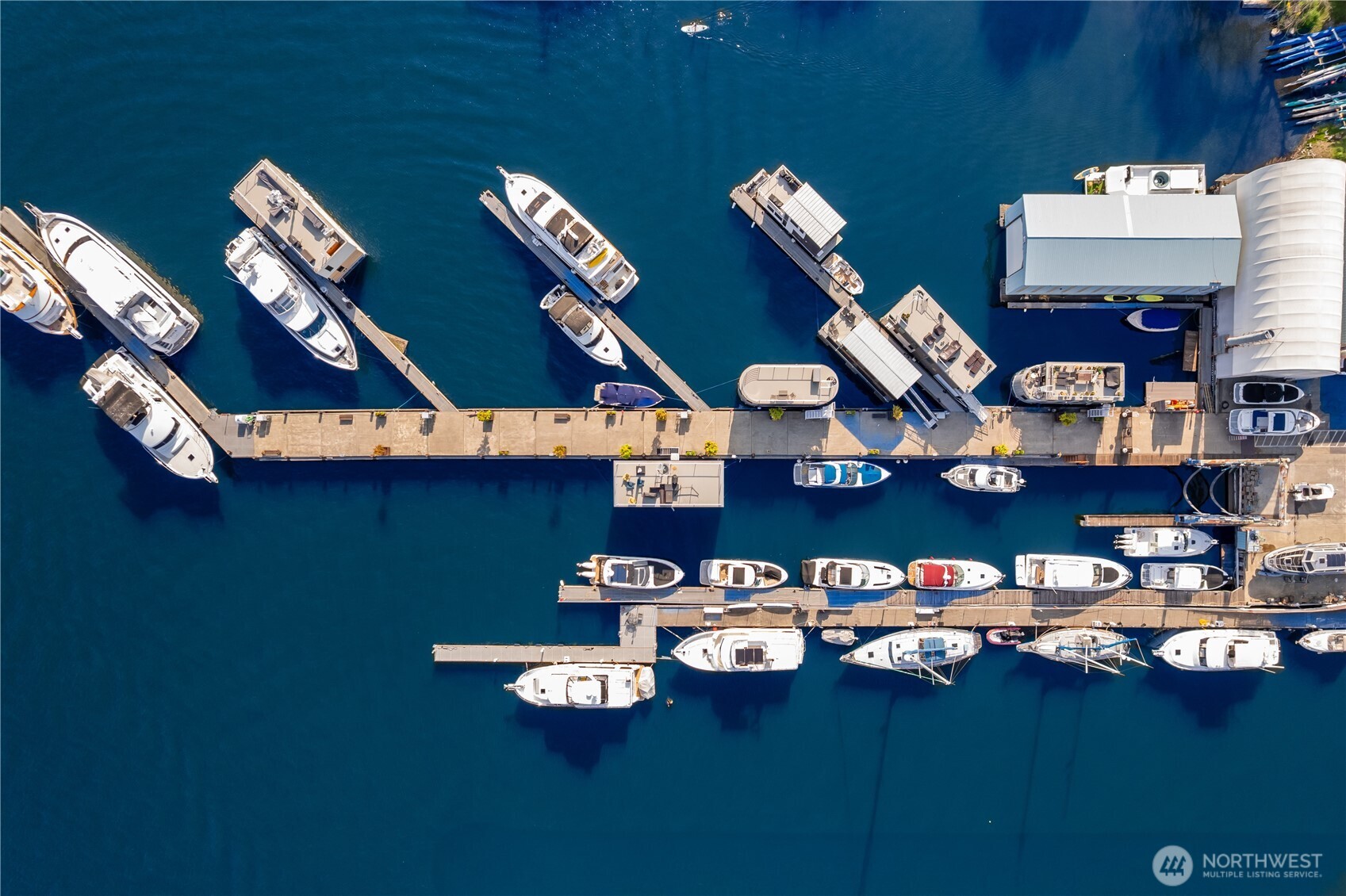 2309 North Northlake Way, Unit 12 Seattle, WA 98103 - Photo 9 of 9 a view of a room with lots of white furniture