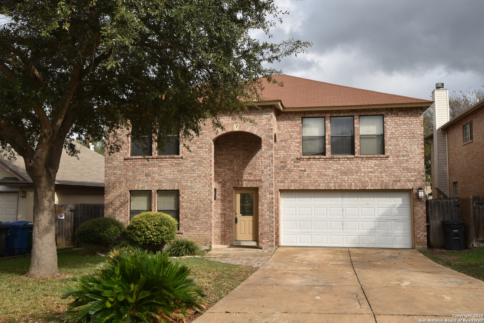 1607 Pinetum Drive San Antonio, TX 78213 - Photo 1 of 26 a front view of a house with garden