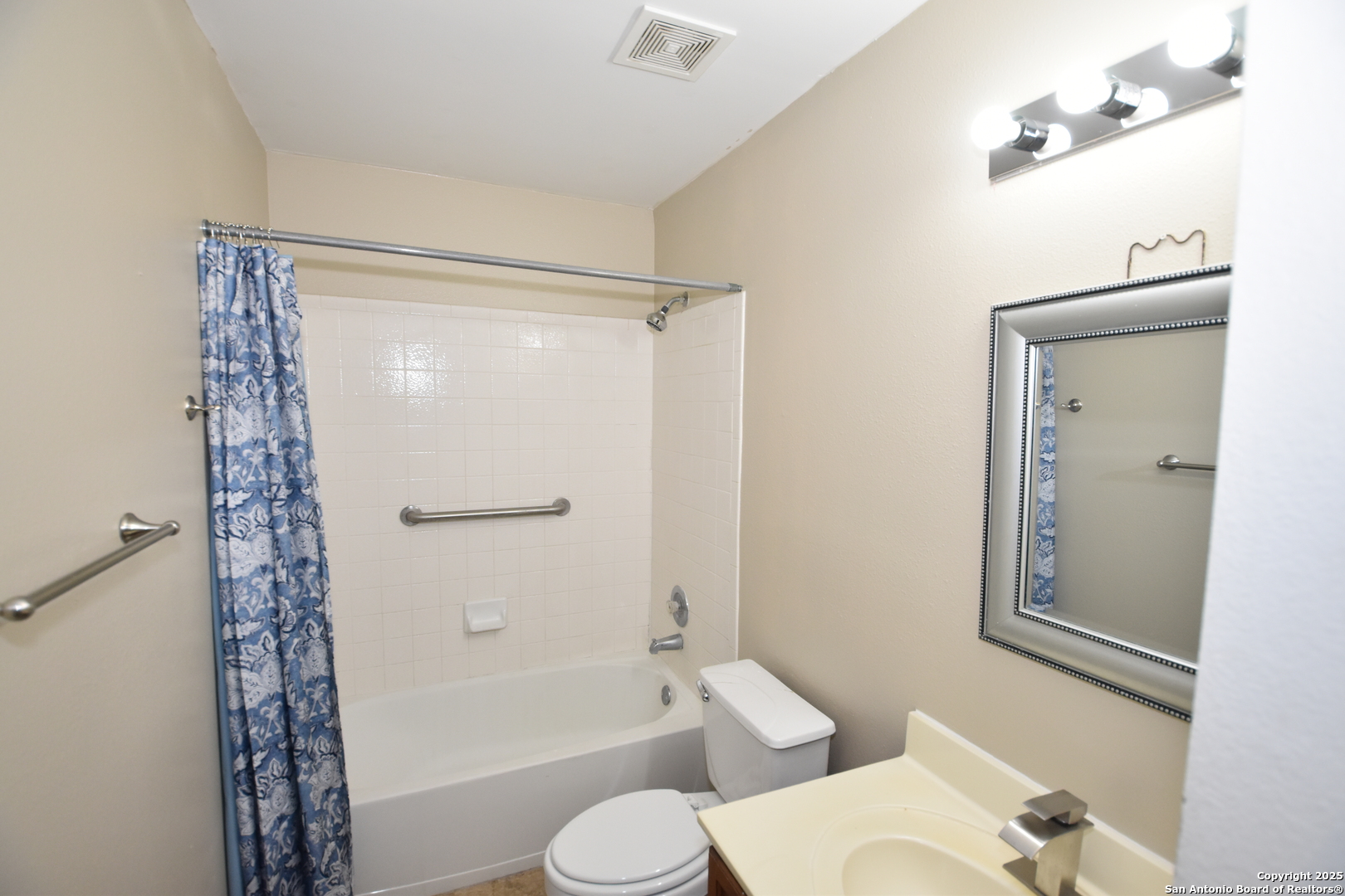 1607 Pinetum Drive San Antonio, TX 78213 - Photo 17 of 26 a bathroom with a shower a toilet and a sink