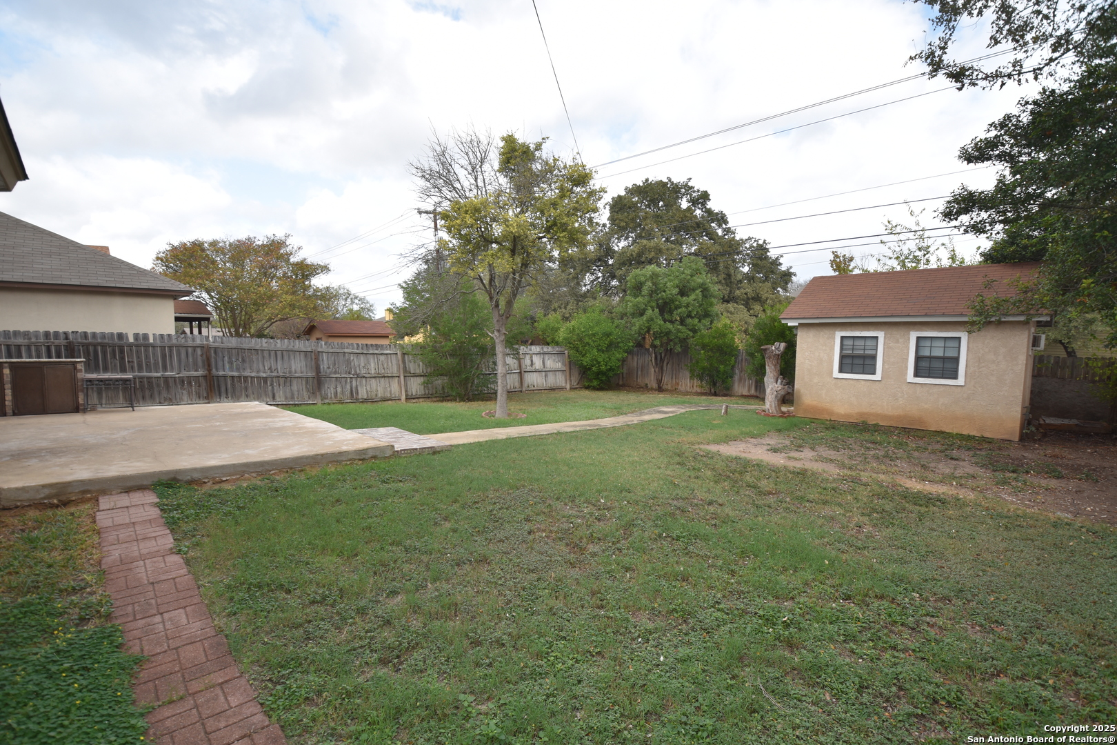 1607 Pinetum Drive San Antonio, TX 78213 - Photo 26 of 26 a view of a backyard with a garden