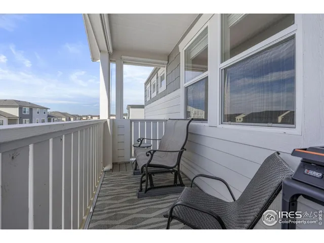 a front view of residential houses with yard