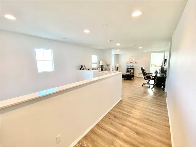 a living room with furniture fireplace and a flat screen tv