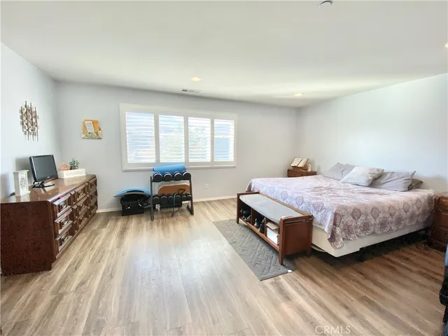 a bed room with a bed and furniture