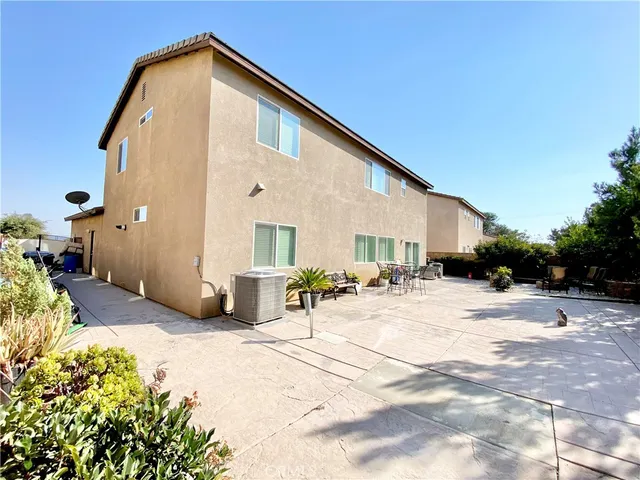 a view of a house with a patio