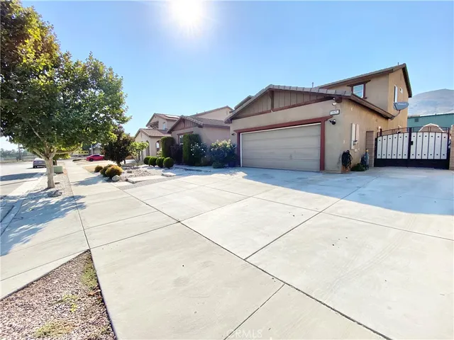 a view of a house with a street