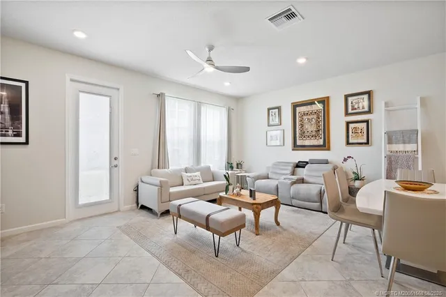 a living room with a fireplace furniture and a fireplace