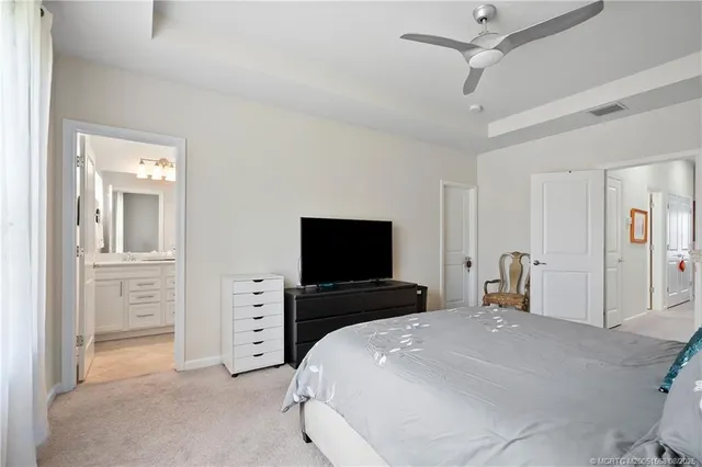 a bathroom with a shower and a sink