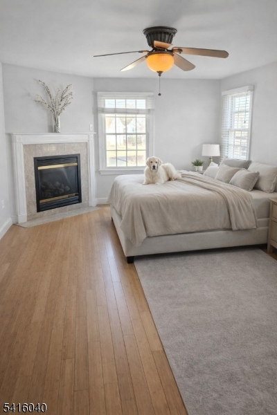 812 Old York Road Raritan, NJ 08869 - Photo 14 of 16 a spacious bedroom with a bed and a fireplace