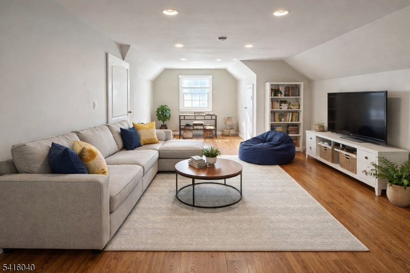 812 Old York Road Raritan, NJ 08869 - Photo 15 of 16 a living room with furniture and a flat screen tv