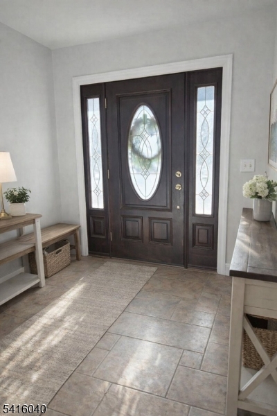 812 Old York Road Raritan, NJ 08869 - Photo 2 of 16 a living room with furniture a clock and a window