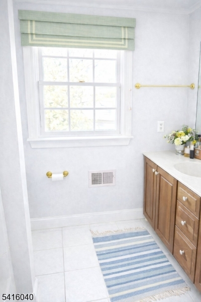 812 Old York Road Raritan, NJ 08869 - Photo 7 of 16 a bathroom with a bathtub and a window