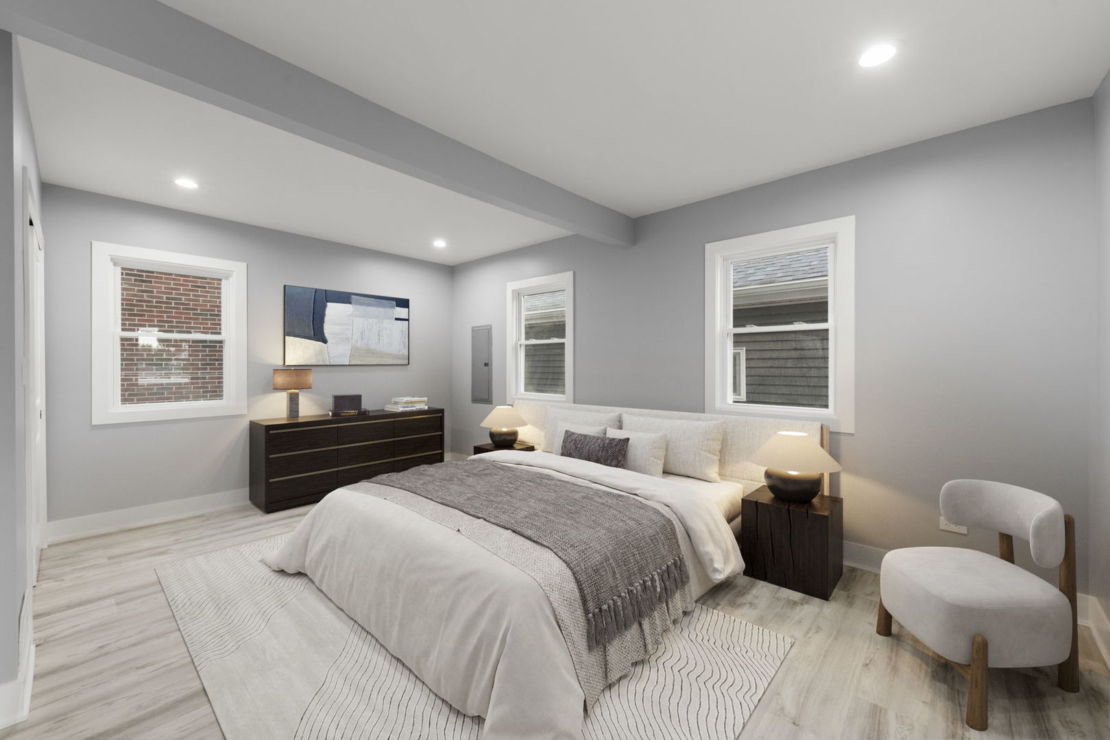 7600 West 60th Street Summit, IL 60501 - Photo 9 of 22 a spacious bedroom with a bed a couch and a window