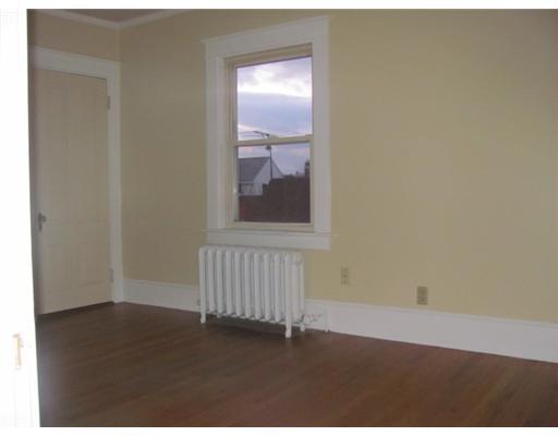 17 Howe Street Lewiston, ME 04240 - Photo 7 of 13 Living Room.