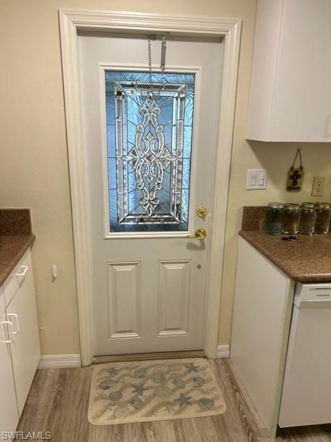15 Cannes Drive Naples, FL 34112 - Photo 12 of 33 a view of entryway with wooden floor
