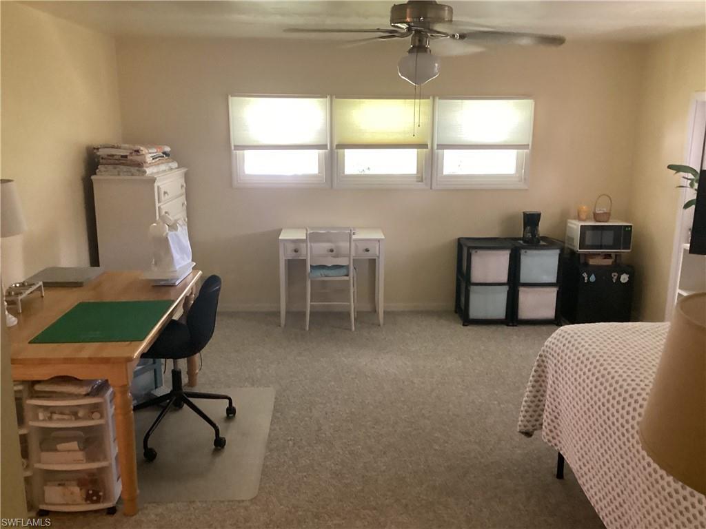 15 Cannes Drive Naples, FL 34112 - Photo 15 of 33 a living room with furniture