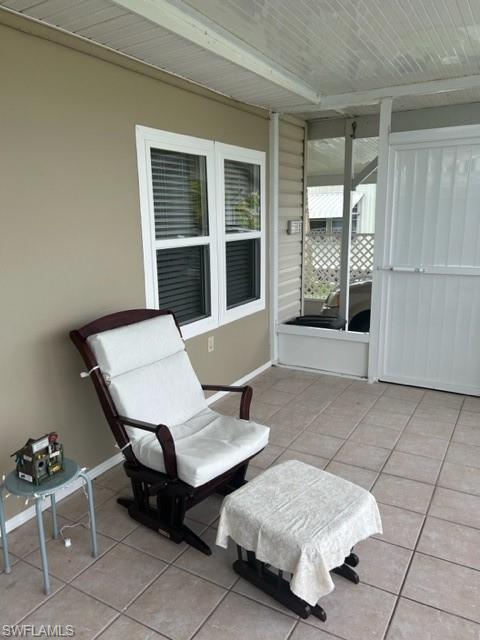 15 Cannes Drive Naples, FL 34112 - Photo 19 of 33 a living room with furniture and next to a window