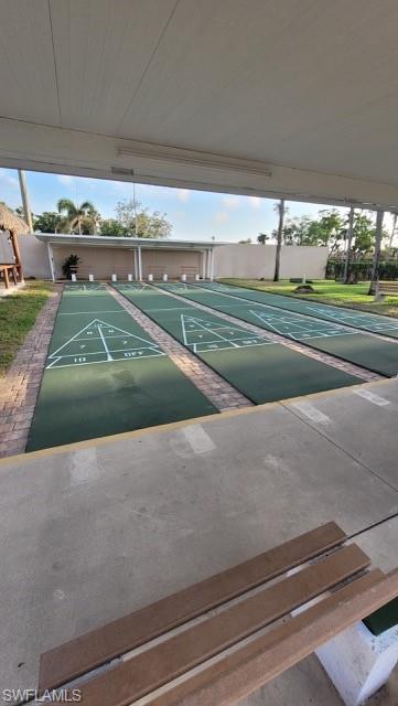 15 Cannes Drive Naples, FL 34112 - Photo 24 of 33 a view of a tennis court