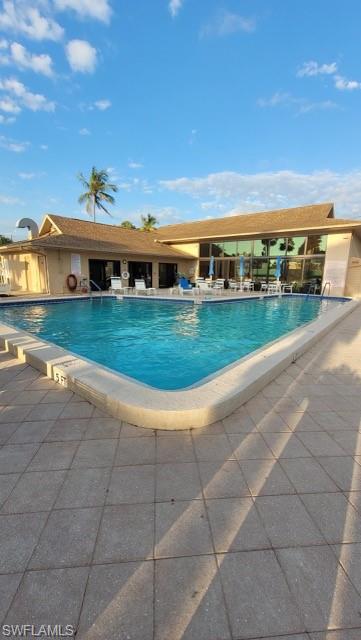 15 Cannes Drive Naples, FL 34112 - Photo 26 of 33 a view of a big room with a big yard