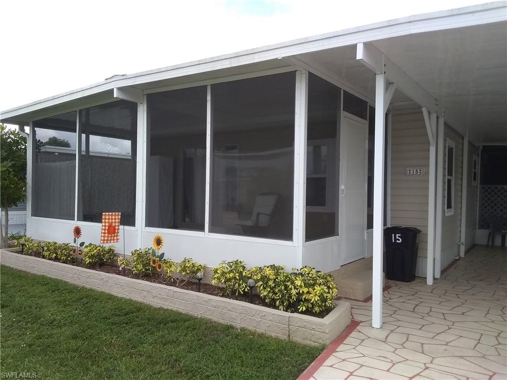 15 Cannes Drive Naples, FL 34112 - Photo 30 of 33 a front view of a house