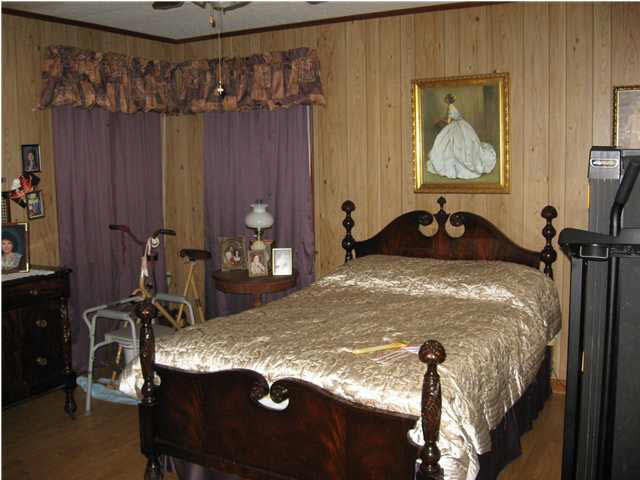 204 Blackjack Road Collins, MS 39428 - Photo 5 of 12 Master bedroom with bath